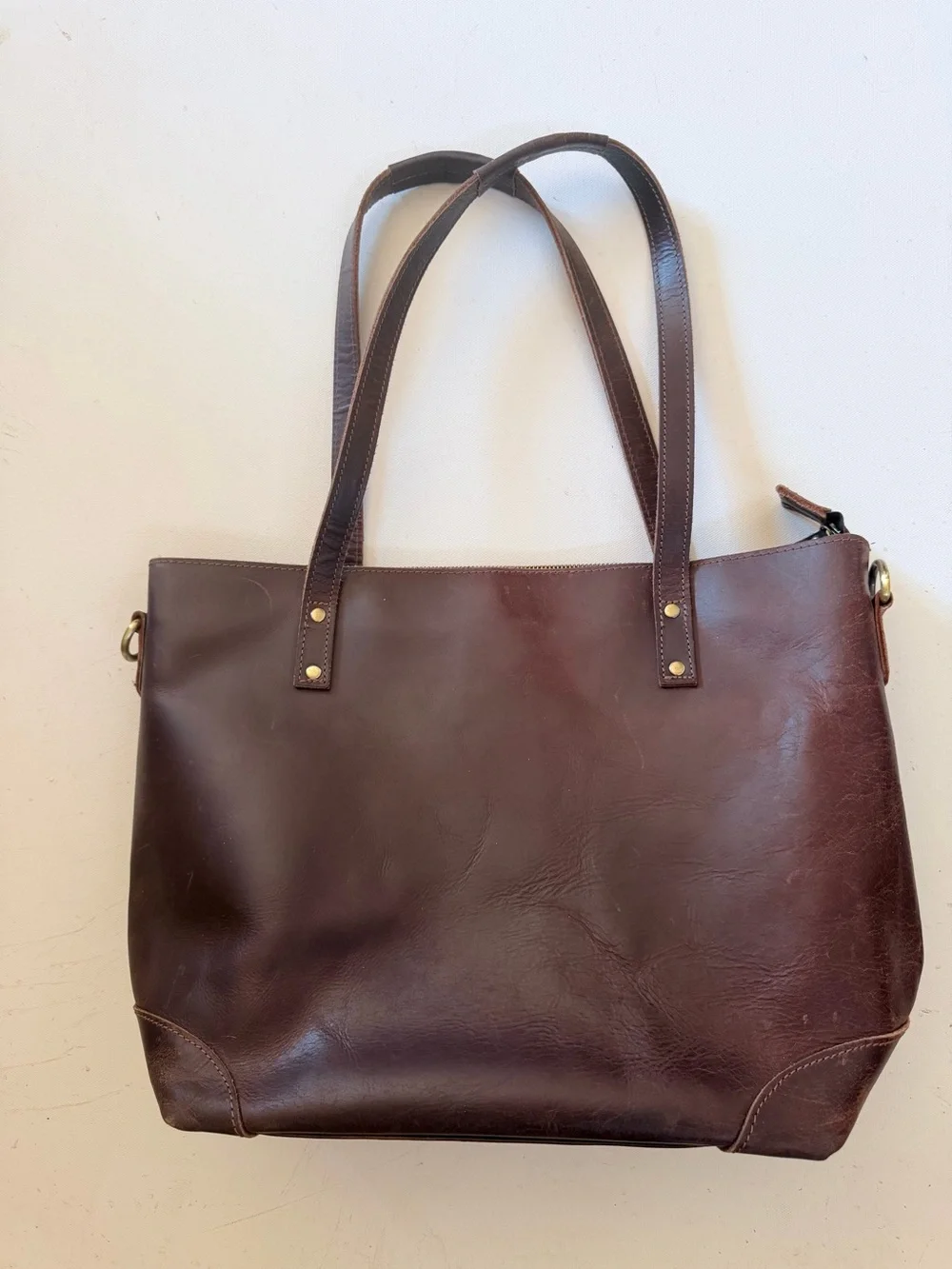 Brown leather messenger bag